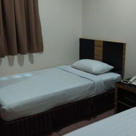 Hotel Traveller Kota Kinabalu Oda fotoğraf