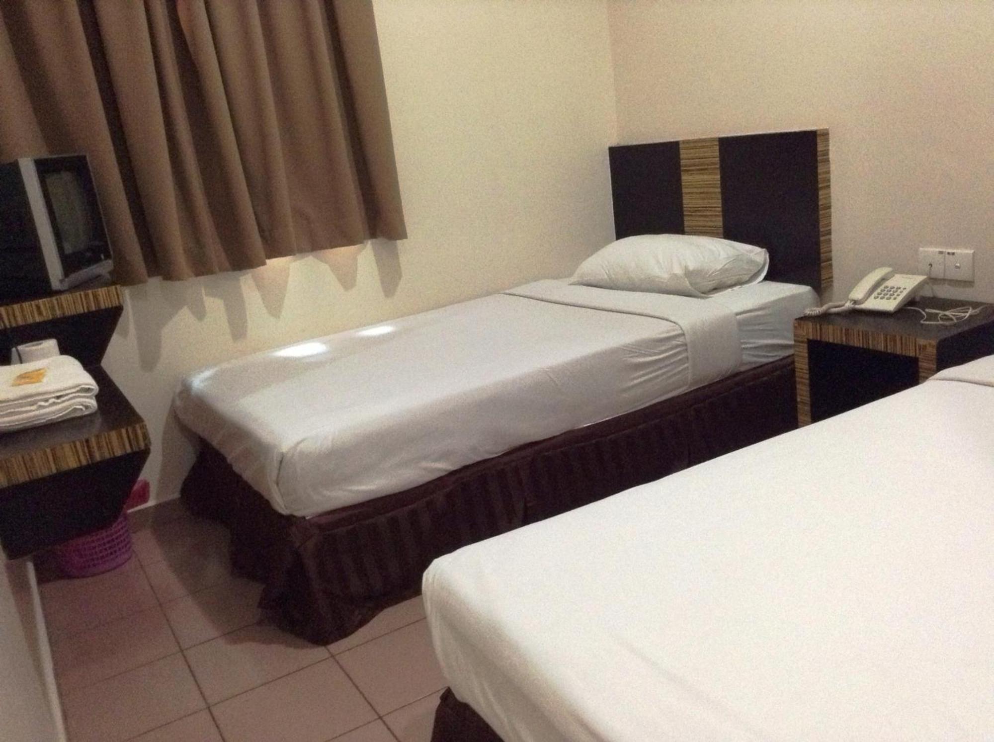 Hotel Traveller Kota Kinabalu Oda fotoğraf