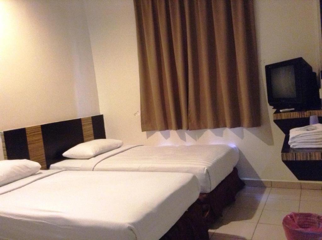 Hotel Traveller Kota Kinabalu Oda fotoğraf